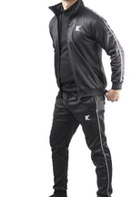 Person wearing a black tracksuit with white stripes and a brand logo on a white background