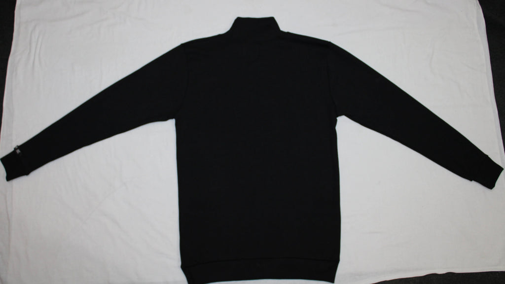 Black turtleneck sweater on a white background
