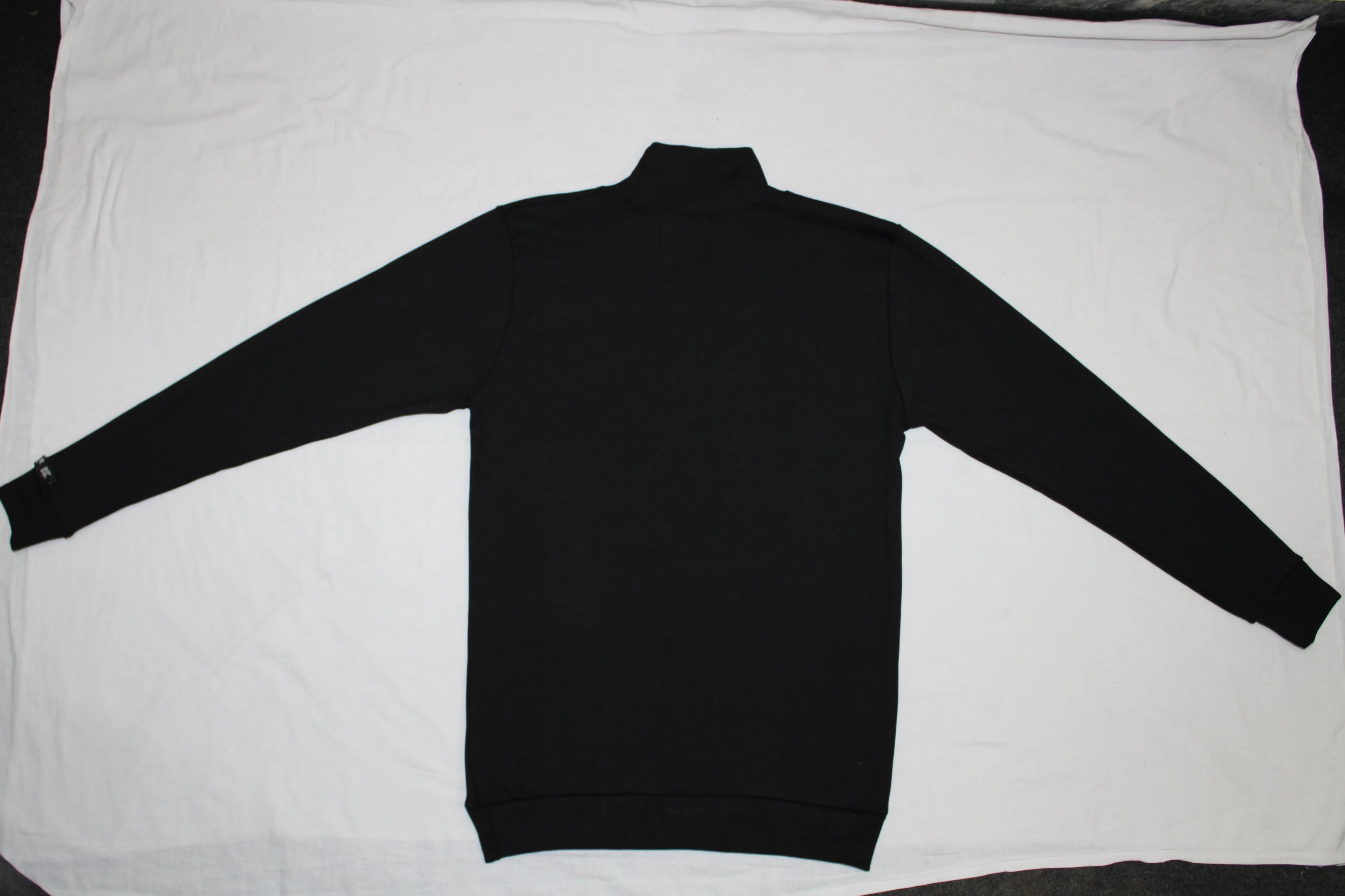 Black sweater on a white background